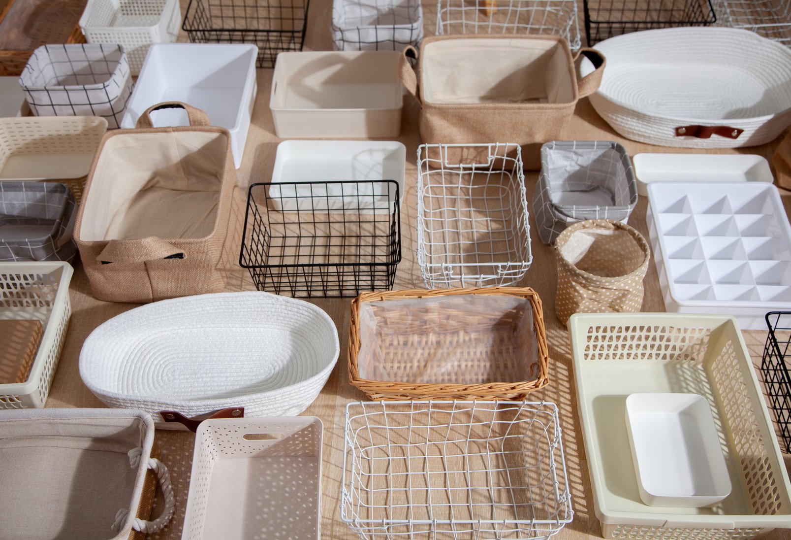 Flat lay of Marie Kondo's storage boxes, containers and baskets with different sizes and shapes